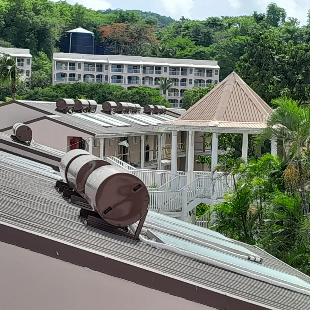 Solar water heater system with vacuum tube collectors installed for optimal sun exposure